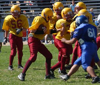 Andrew carries the ball against Bishop - October 1, 2005