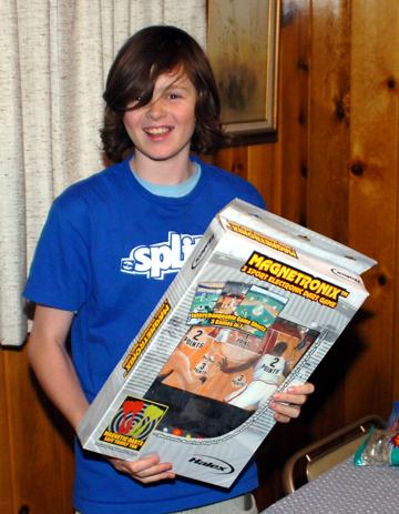 Andrew turned 13 on January 31, 2006 - He opened some gifts from grandmother Vee on January 25
