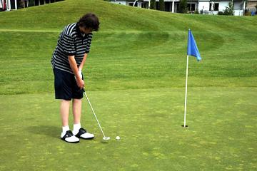 Putting on first hole at Riverridge Nine